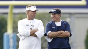 FILE - In this Aug. 10, 2010, file photo, New England Patriots head coach Bill Belichick and New Orleans Saints head coach Sean Payton look on during a joint football practice in Foxborough, Mass. The Saints and Patriots meet Sunday, sharing mutual respect and some similarities, starting with top coaches who have forged close relationships with elite quarterbacks.  (AP Photo/Winslow Townson, File)